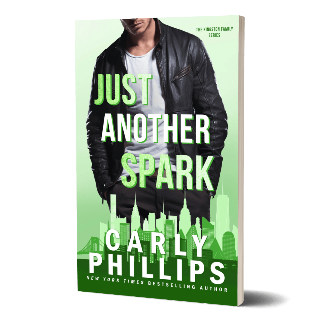 Book cover of 'Just Another Spark' by Carly Phillips with a sexy man wearing a leather jacket.