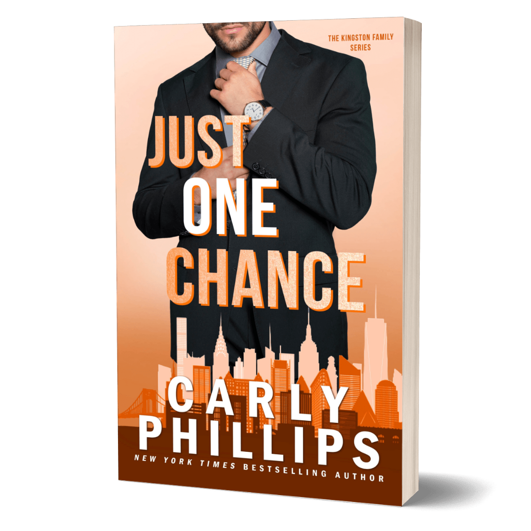 Book cover of 'Just One Chance' by Carly Phillips with a man adjusting his tie against an orange cityscape background.