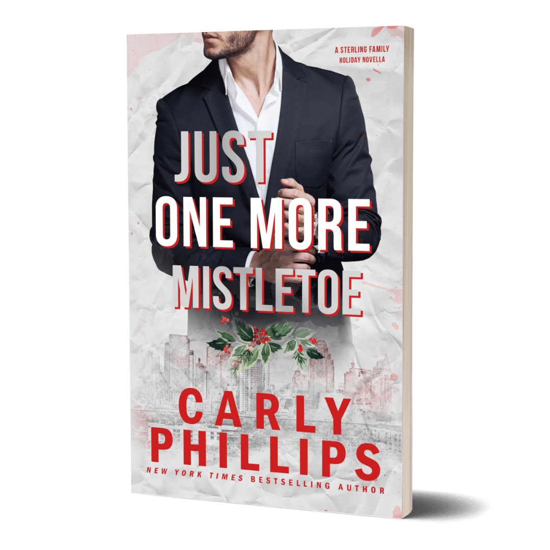 Book cover of 'Just One More Mistletoe' by Carly Phillips with a man in a suit and mistletoe design.