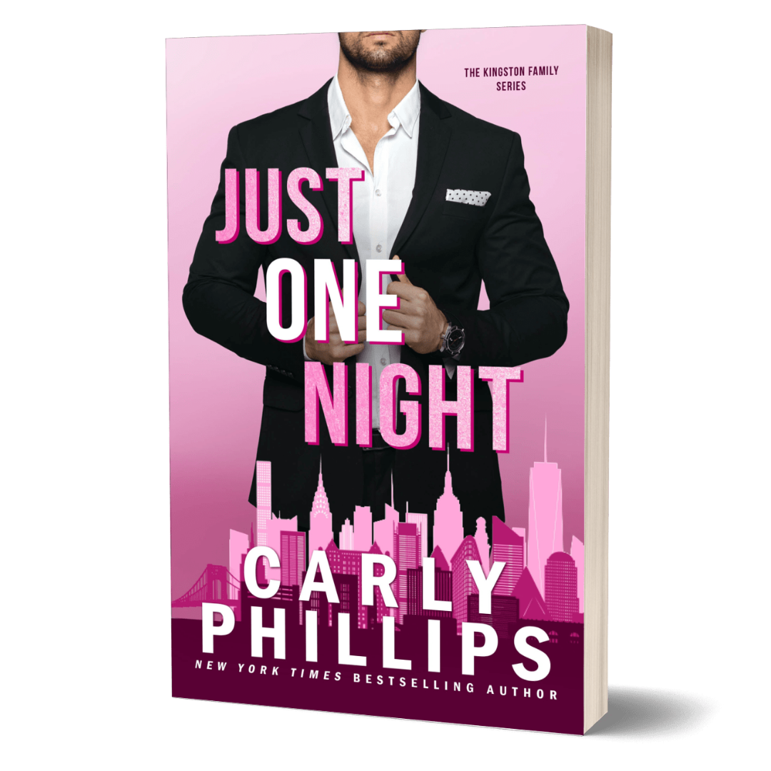 Book cover of 'Just One Night' by Carly Phillips with a man in a suit on a pink background